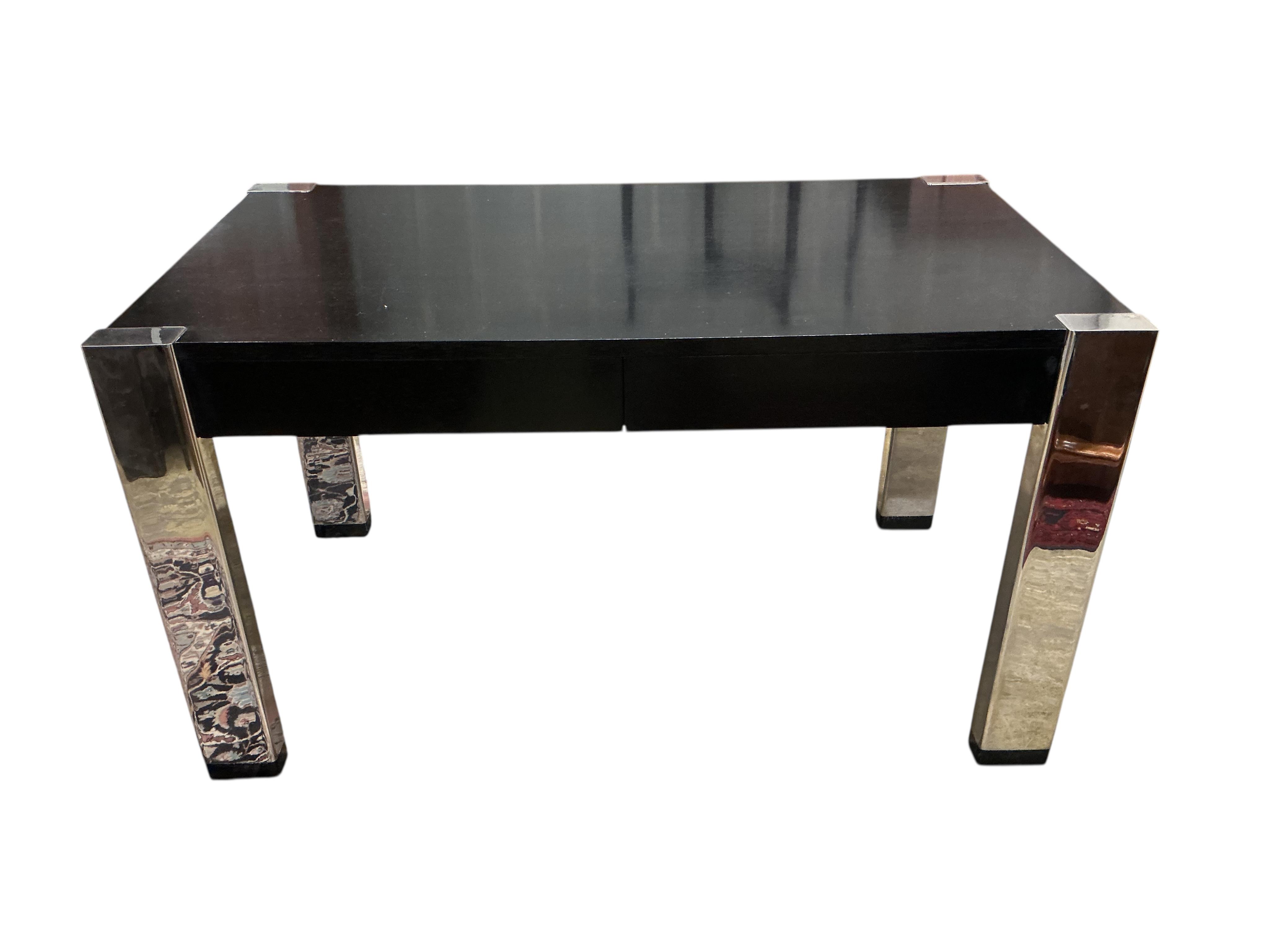 A Contemporary ebonised and chrome desk, retailed by Harrods, width 139cm, depth 78cm, height 78cm